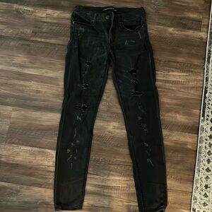 Express dark grey/light black distressed jeans. Size 4R.